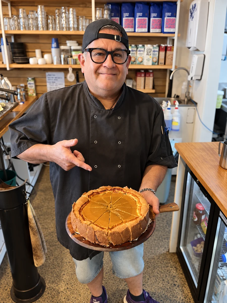 On Levers Cafe chef holding a freshly baked tart